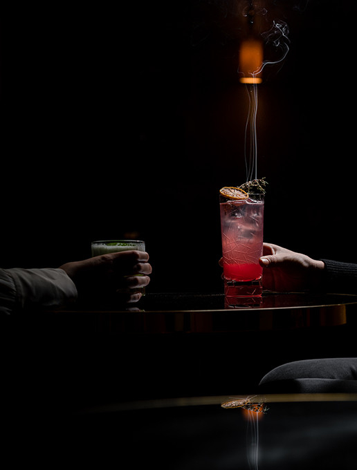 Married couple toasting their wedding anniversary at the Dans le Noir ? restaurant